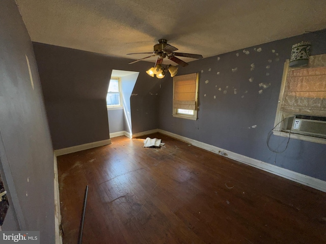 605 Walnut Ave, Baltimore, MD 21229 - additional living space with a ceiling fan, cooling unit, wood finished floors, a textured ceiling, and baseboards