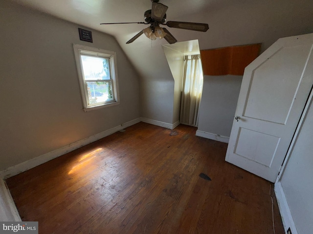 605 Walnut Ave, Baltimore, MD 21229 - additional living space featuring baseboards, wood finished floors, vaulted ceiling, and a ceiling fan