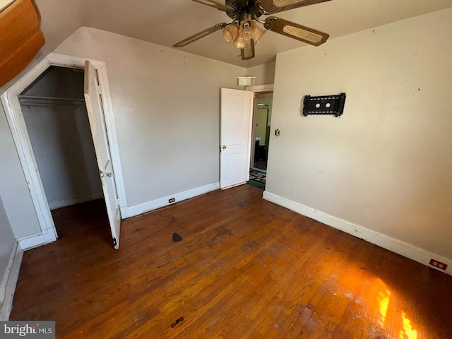 605 Walnut Ave, Baltimore, MD 21229 - unfurnished bedroom featuring baseboards, wood finished floors, vaulted ceiling, and a closet