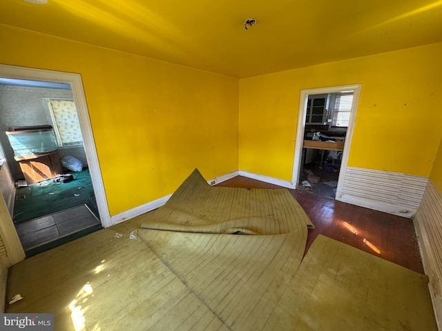 605 Walnut Ave, Baltimore, MD 21229 - spare room with baseboards and hardwood / wood-style flooring