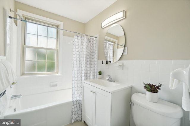 2507 Arlington Blvd Unit 20, Arlington, VA 22201 - bathroom with toilet, shower / tub combo with curtain, vanity, wainscoting, and tile walls