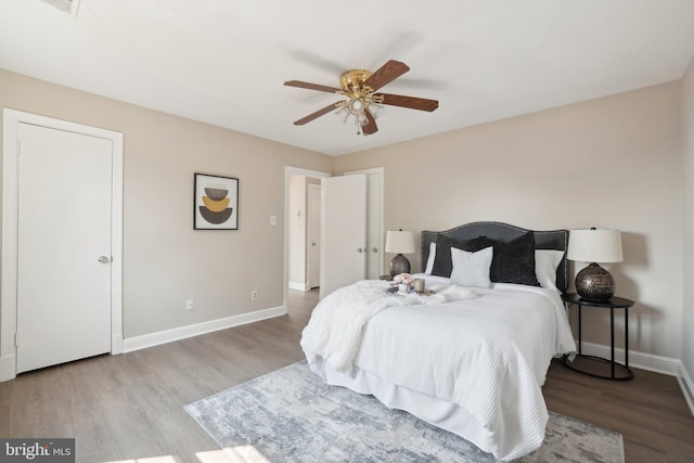 2507 Arlington Blvd Unit 20, Arlington, VA 22201 - bedroom with baseboards, ceiling fan, and wood finished floors