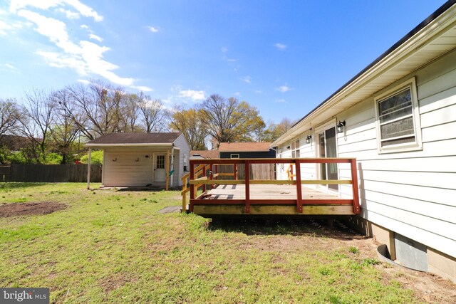 1405 Westchester St, Salisbury, MD 21801 - wooden terrace with a lawn, an outbuilding, and fence