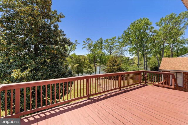 deck with view of scattered trees