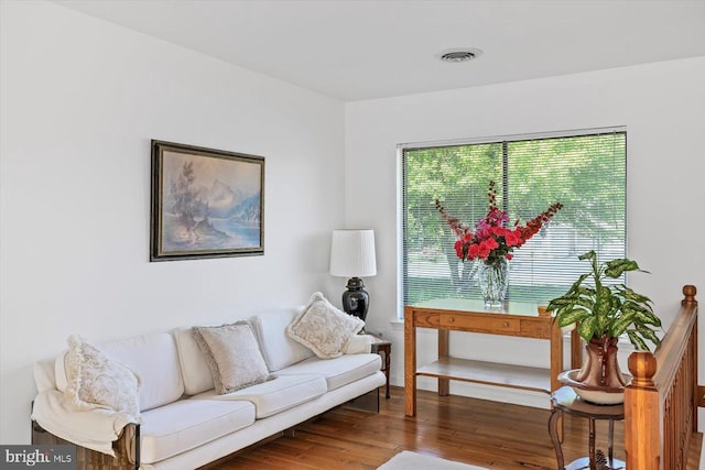 living area with wood finished floors