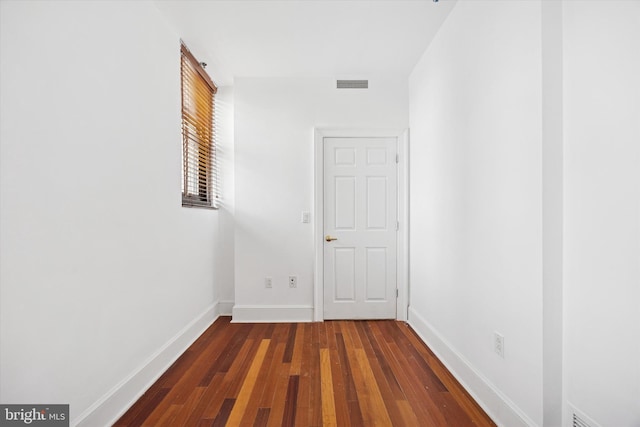 1500 Chestnut St Unit 15H, Philadelphia, PA 19102 - hall featuring visible vents, dark wood-style flooring, and baseboards