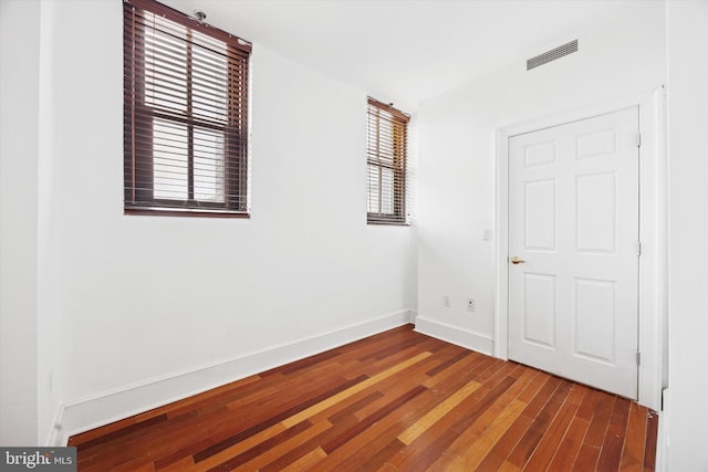 1500 Chestnut St Unit 15H, Philadelphia, PA 19102 - empty room featuring wood finished floors, baseboards, and visible vents