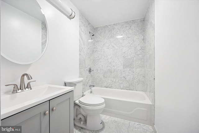 1500 Chestnut St Unit 15H, Philadelphia, PA 19102 - bathroom with toilet, vanity, marble finish floor, and washtub / shower combination