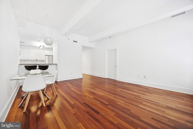 1500 Chestnut St Unit 15H, Philadelphia, PA 19102 - living room featuring baseboards, dark wood-style flooring, beam ceiling, and visible vents