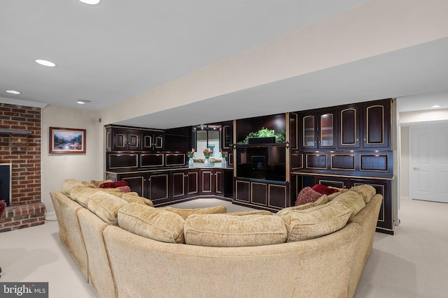 living area featuring recessed lighting and light carpet