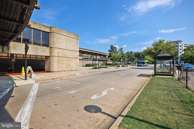 view of street with sidewalks and curbs