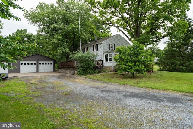 669 Dicks Hollow Rd, Winchester, VA 22603 - view of front of house with an outdoor structure, a garage, a deck, and a front yard