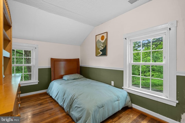 669 Dicks Hollow Rd, Winchester, VA 22603 - bedroom featuring lofted ceiling, hardwood / wood-style flooring, and baseboards