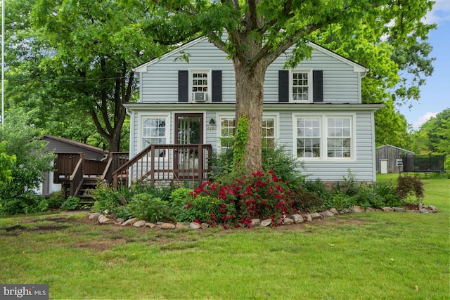 669 Dicks Hollow Rd, Winchester, VA 22603 - traditional-style home featuring a trampoline, a front yard, and a deck