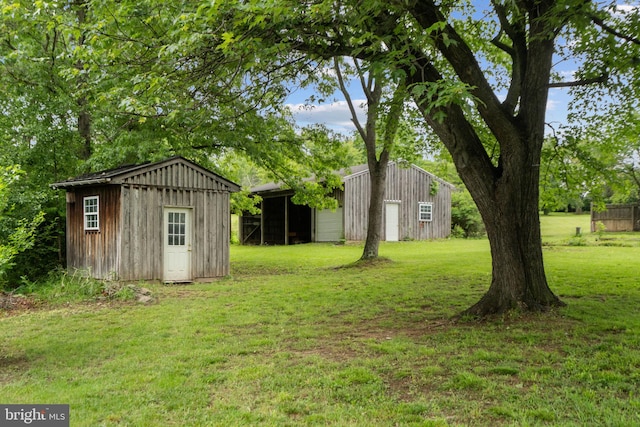 669 Dicks Hollow Rd, Winchester, VA 22603 - view of green lawn with an outdoor structure
