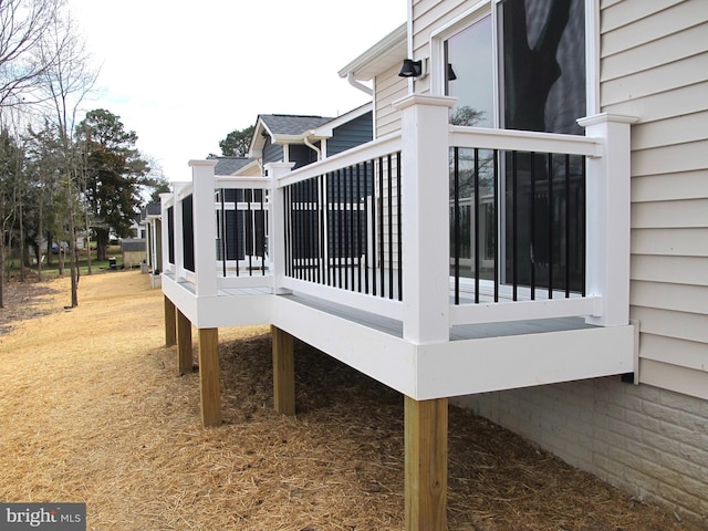 view of property exterior with a deck