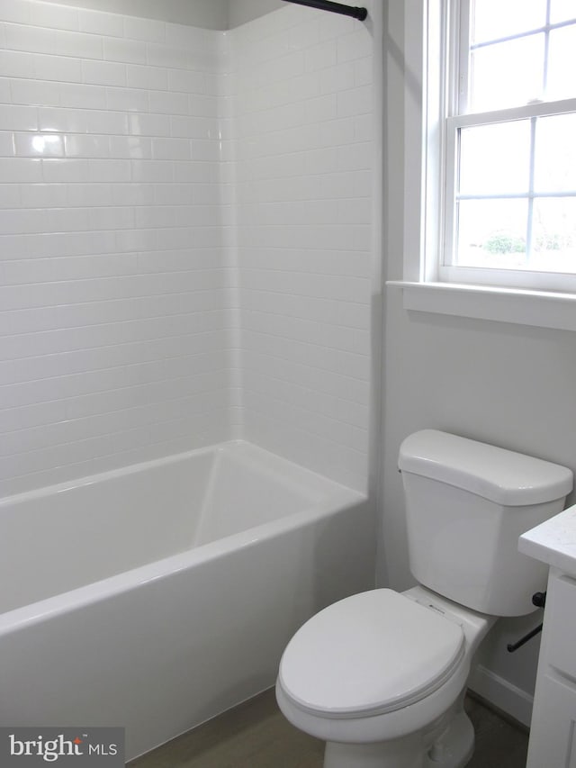 full bath with wood finished floors, toilet, and vanity