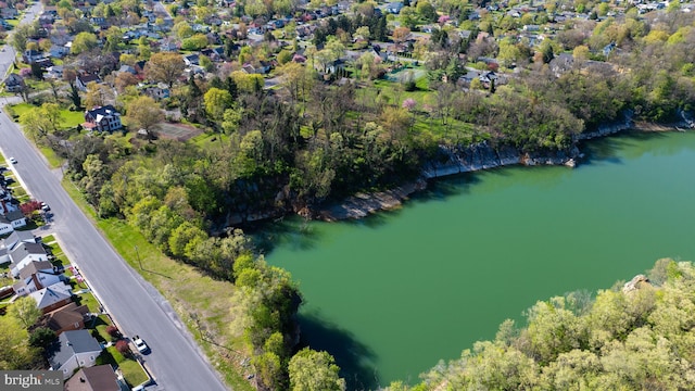 bird's eye view with a residential view and a water view