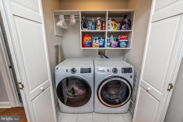 875 Brintons Bridge Rd, West Chester, PA 19382 - clothes washing area with laundry area, washing machine and dryer, and light tile patterned floors