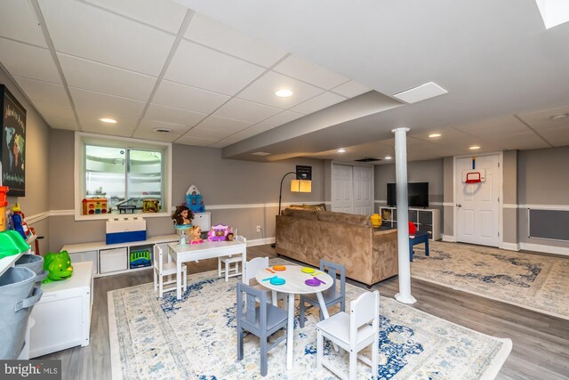 875 Brintons Bridge Rd, West Chester, PA 19382 - rec room featuring baseboards, a paneled ceiling, and wood finished floors