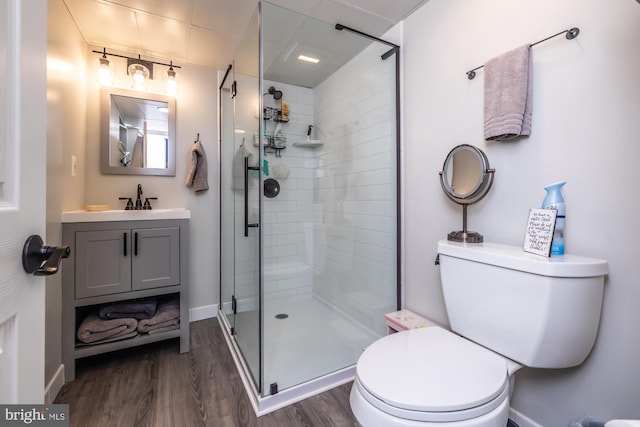 875 Brintons Bridge Rd, West Chester, PA 19382 - full bath with vanity, wood finished floors, toilet, and a shower stall