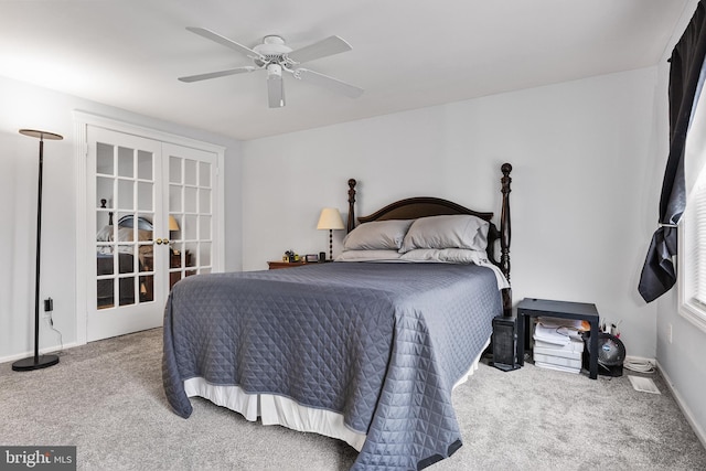 carpeted bedroom featuring french doors, ceiling fan, and baseboards
