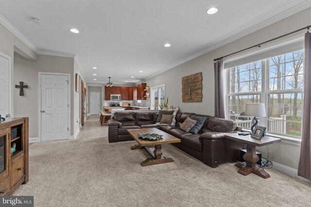 living area with recessed lighting, ornamental molding, and light carpet