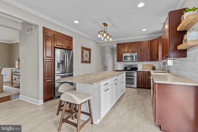 kitchen featuring stainless steel appliances, a sink, visible vents, open shelves, and light countertops
