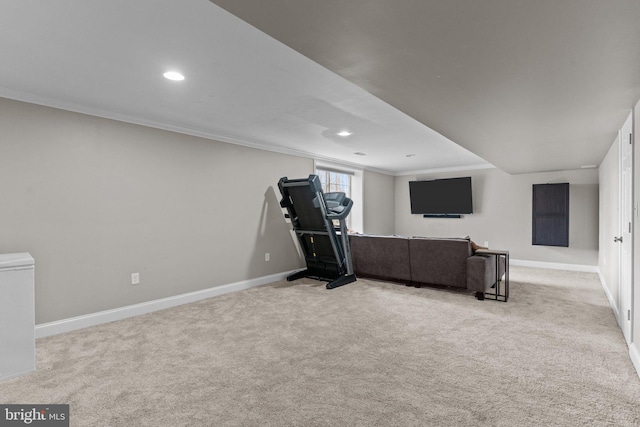 workout area featuring baseboards, carpet floors, ornamental molding, and recessed lighting