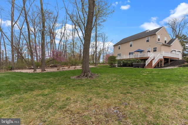 view of yard with a deck