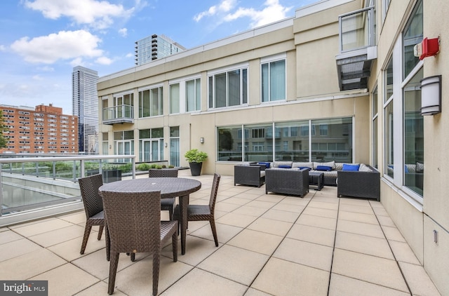 23 S 23rd St Unit 3E, Philadelphia, PA 19103 - view of patio with an outdoor living space and outdoor dining area