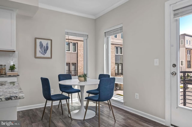 15500 Smoke Box Way, Woodbridge, VA 22191 - dining room featuring baseboards, dark wood finished floors, and ornamental molding