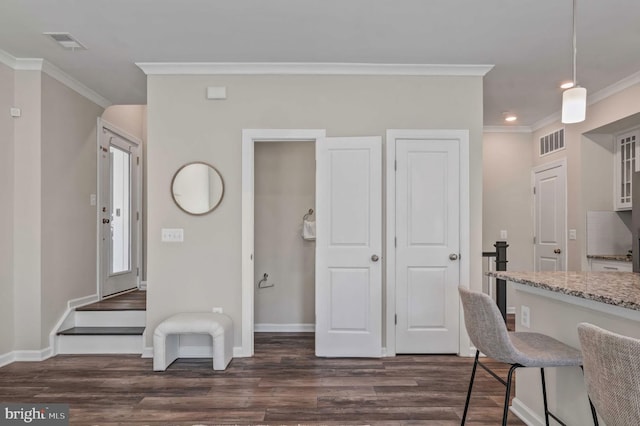 15500 Smoke Box Way, Woodbridge, VA 22191 - interior space with visible vents, ornamental molding, and dark wood-type flooring