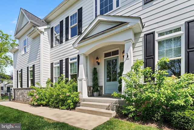 doorway to property with stone siding