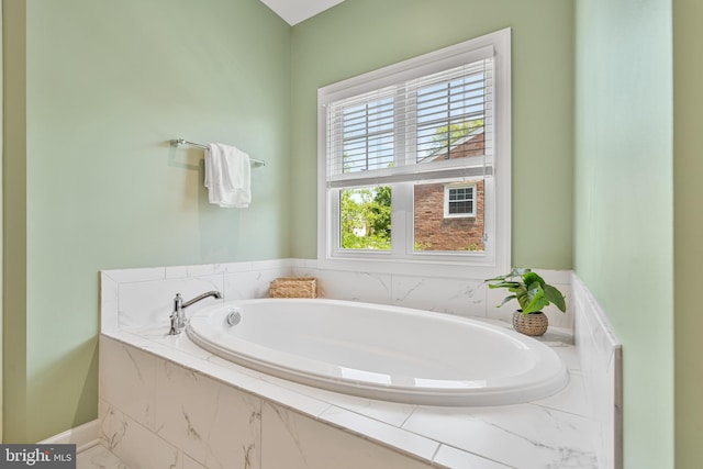 full bathroom featuring a garden tub