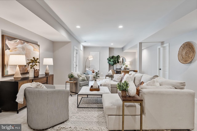 living area with recessed lighting and baseboards