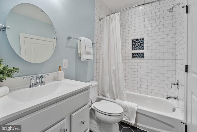 full bathroom with toilet, tile patterned floors, shower / tub combo with curtain, and vanity