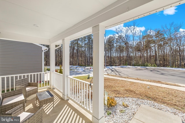 7269 Liberty Ct, Ruther Glen, VA 22546 - view of patio featuring covered porch