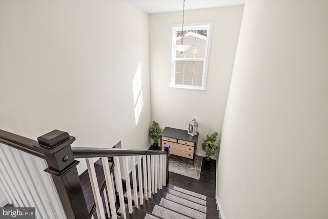 7269 Liberty Ct, Ruther Glen, VA 22546 - stairs featuring baseboards and a notable chandelier