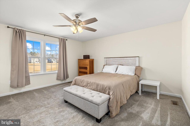 7269 Liberty Ct, Ruther Glen, VA 22546 - carpeted bedroom with ceiling fan and baseboards