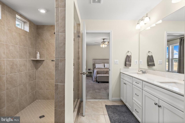 7269 Liberty Ct, Ruther Glen, VA 22546 - bathroom with a tile shower, ensuite bath, double vanity, and a sink