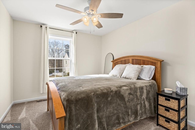 7269 Liberty Ct, Ruther Glen, VA 22546 - bedroom with visible vents, baseboards, a ceiling fan, and carpet floors