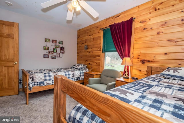 134 Highland Ave, Accident, MD 21520 - bedroom with wooden walls, carpet, and a ceiling fan