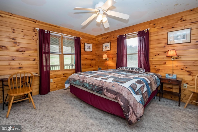 134 Highland Ave, Accident, MD 21520 - carpeted bedroom featuring a ceiling fan and wooden walls
