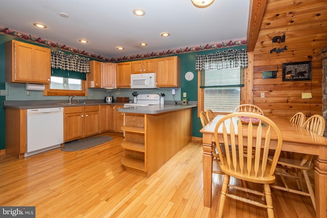134 Highland Ave, Accident, MD 21520 - kitchen with open shelves, light wood-type flooring, white appliances, decorative backsplash, and a sink