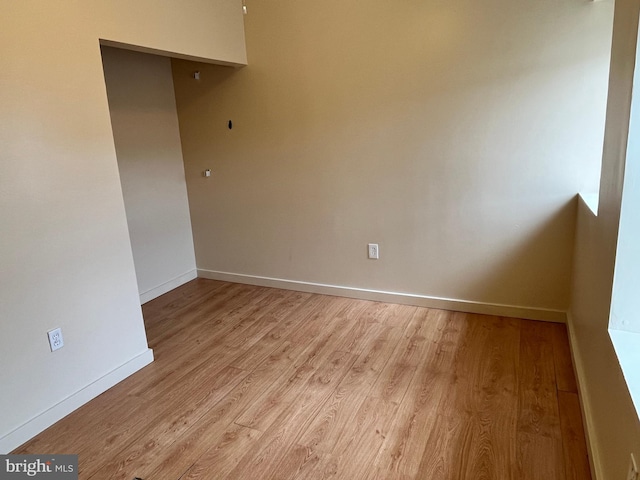 1921 W Diamond St, Philadelphia, PA 19121 - empty room with baseboards and light wood-style flooring
