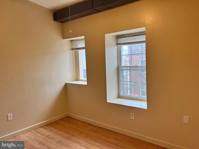 1921 W Diamond St, Philadelphia, PA 19121 - unfurnished room featuring baseboards and wood finished floors