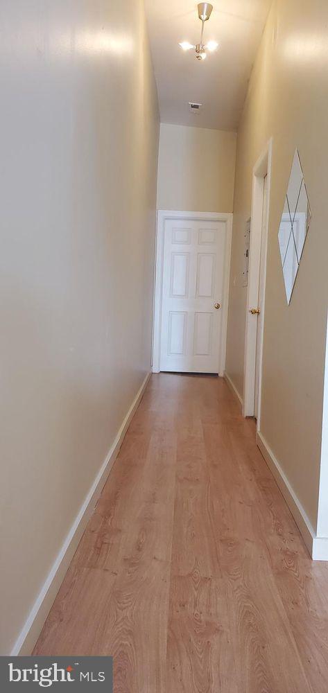 1921 W Diamond St, Philadelphia, PA 19121 - hall featuring baseboards, light wood-type flooring, and visible vents
