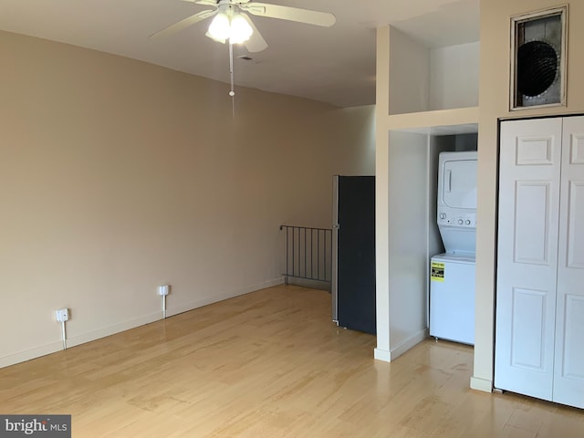 1921 W Diamond St, Philadelphia, PA 19121 - spare room with a ceiling fan, baseboards, light wood-style floors, and stacked washer / drying machine