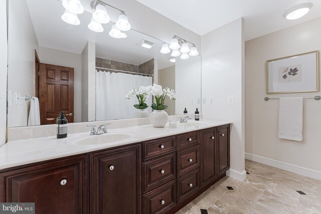 142 N French St, Alexandria, VA 22304 - full bath featuring marble finish flooring, double vanity, baseboards, and a shower with curtain